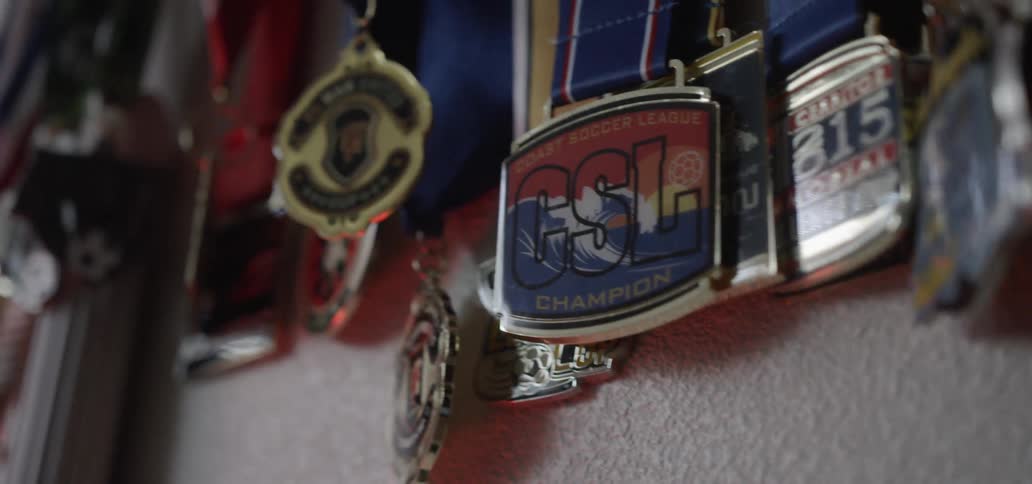 Medals hanging on a wall