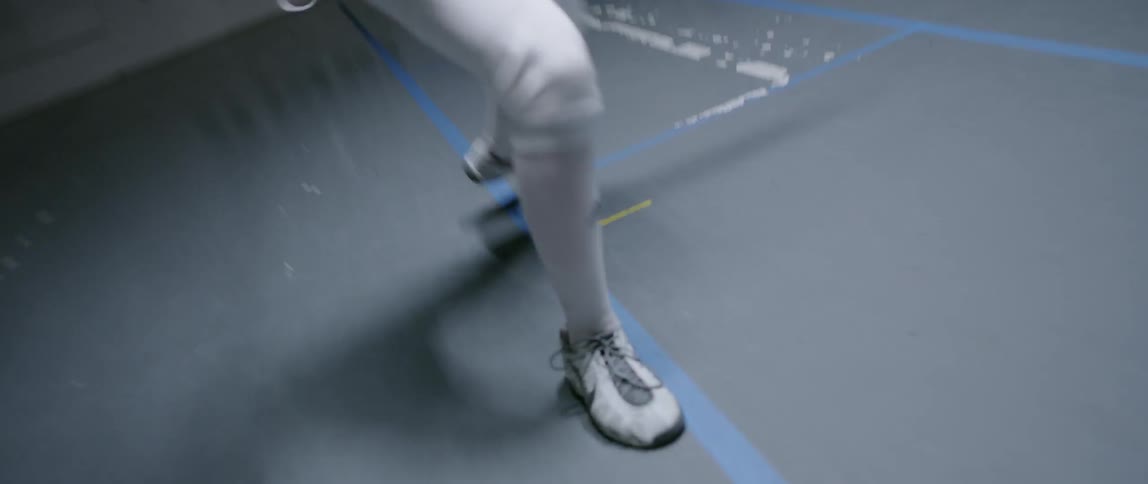 Person fencing in gym