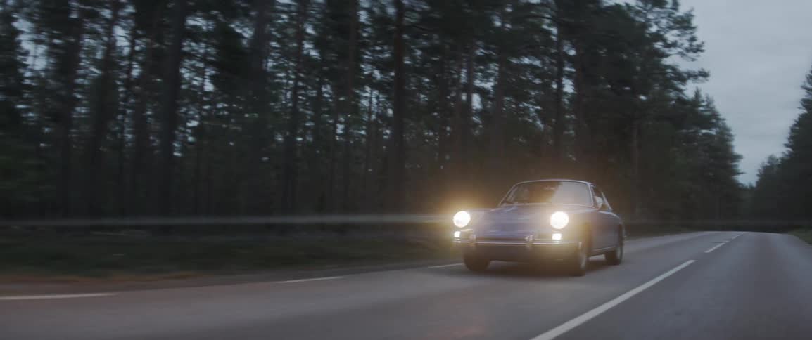 Car drives along a highway