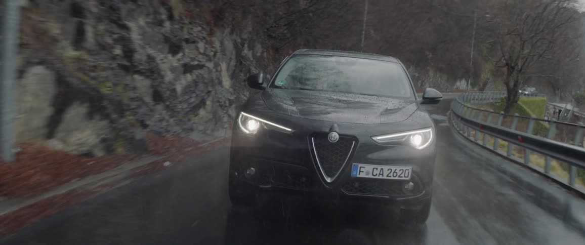 A car drives in a rainstorm