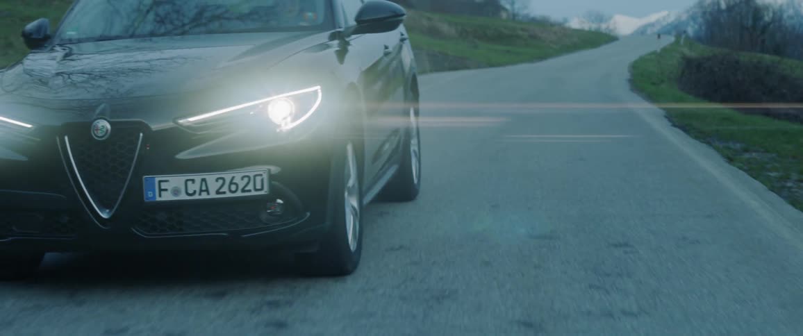 Car descends mountain highway