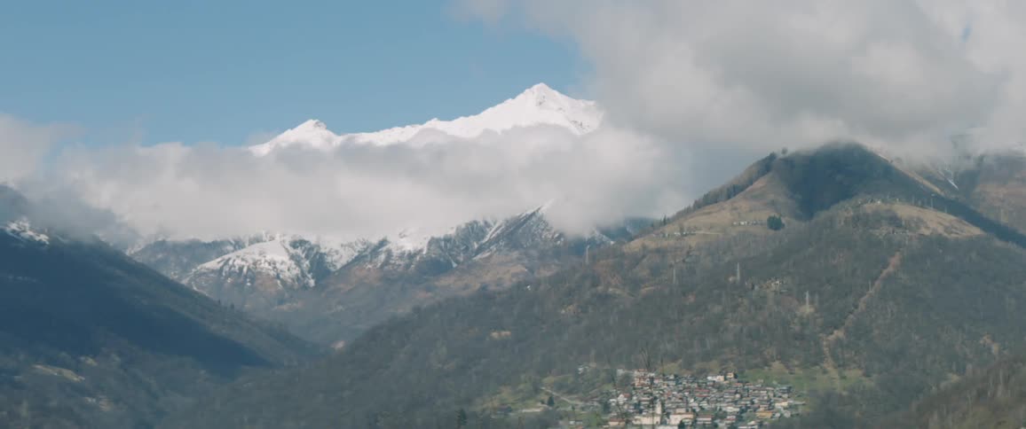 View of mountains through the clouds