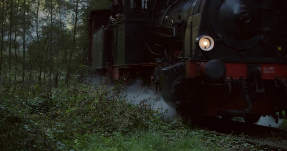 The train is slowly moving around a turn