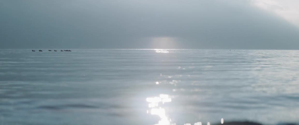 The sun is reflecting off the ocean