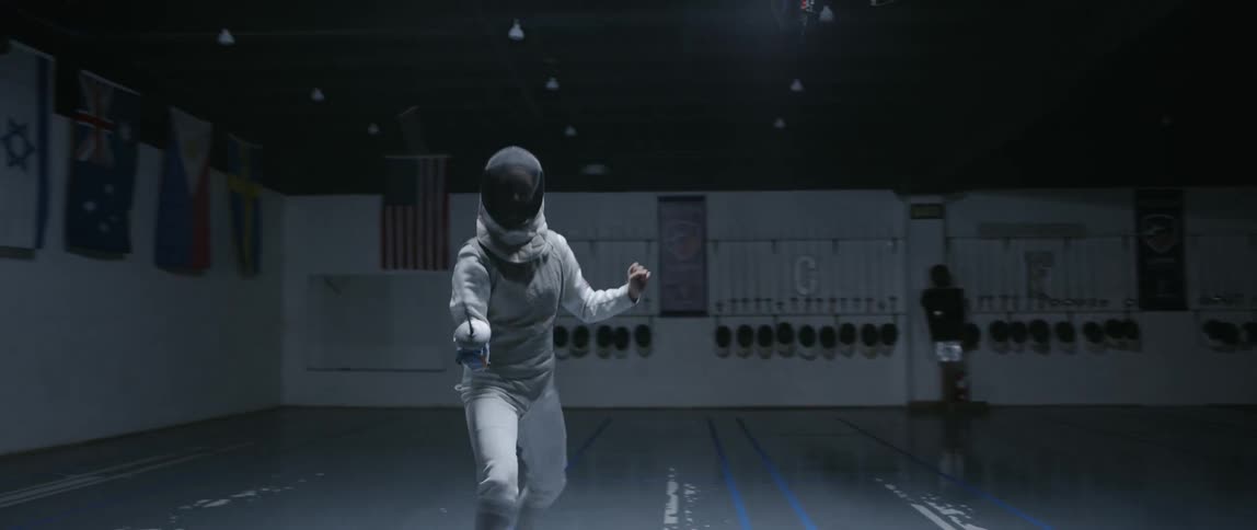 Person practices fencing
