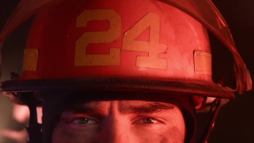 Firefighter near engine lights