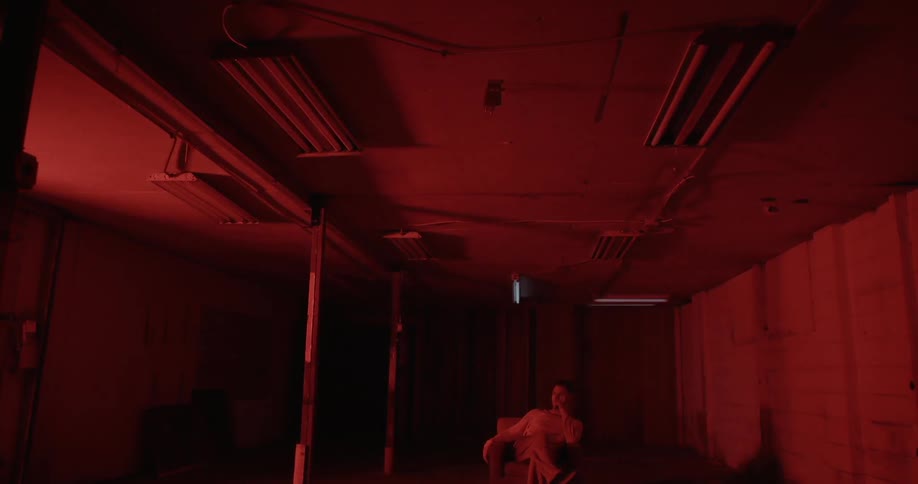 Man Alone In A Warehouse