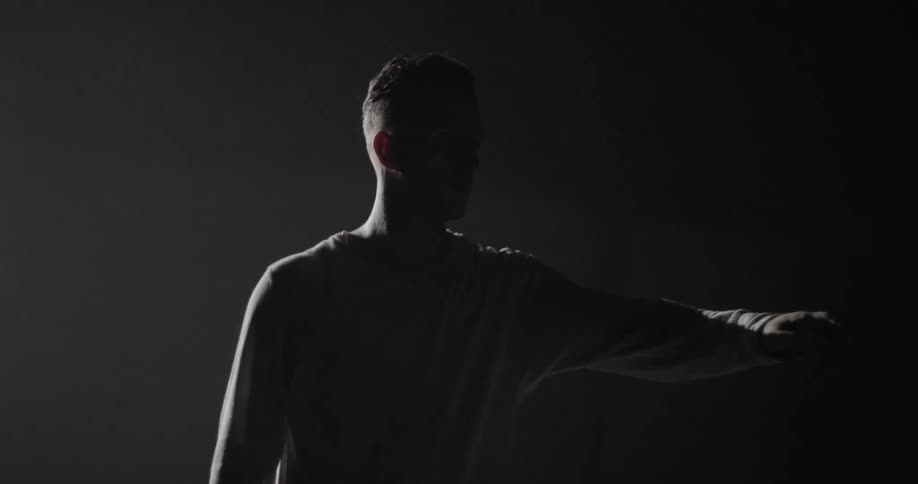 Man Alone In A Warehouse
