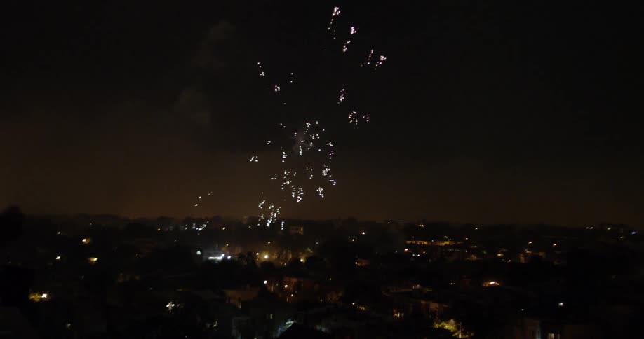 Lightning strikes right before fireworks explode