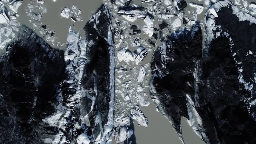 Snow and ice cover a remote landscape