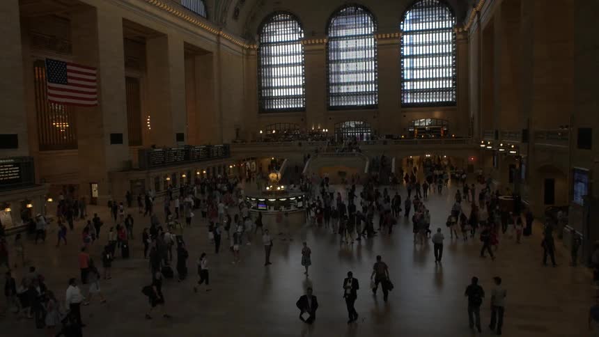 A timelapse of people in a train station