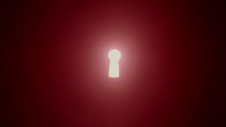 The keyhole has a red light inside