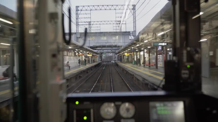 A train travels on the commuter tracks