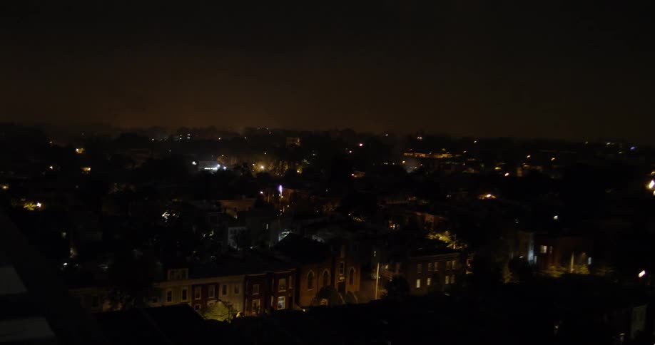 Fireworks explode in the night sky