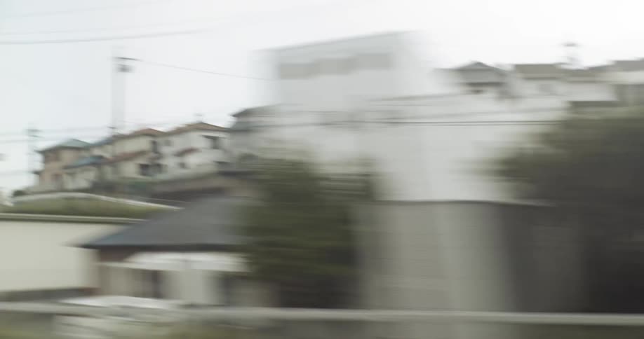 A car drives on a city road