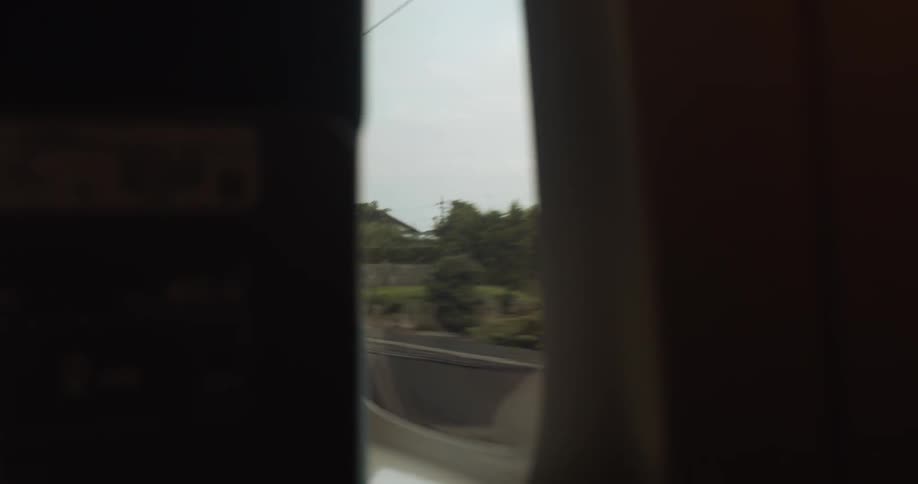 The train is passing the town by fast