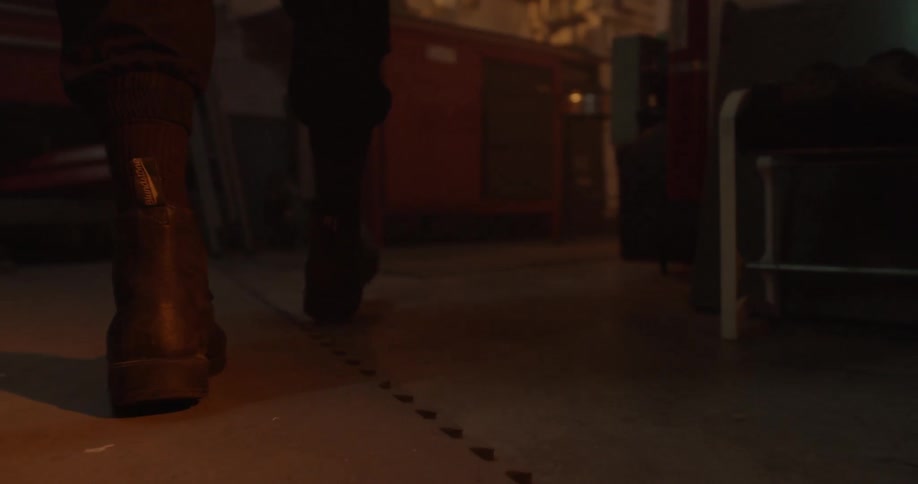 A man walks in the garage