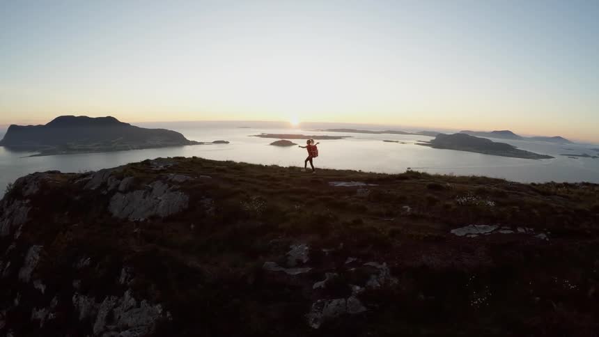 A person walking on a mountain