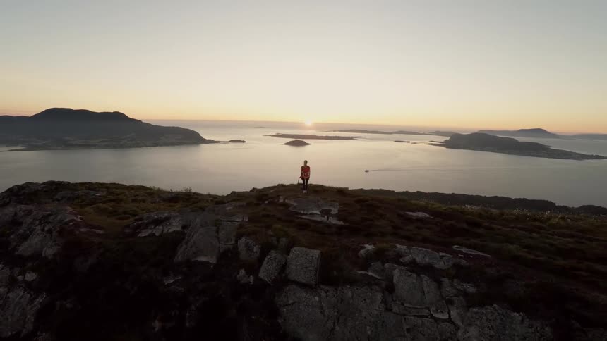A person standing on a mountain