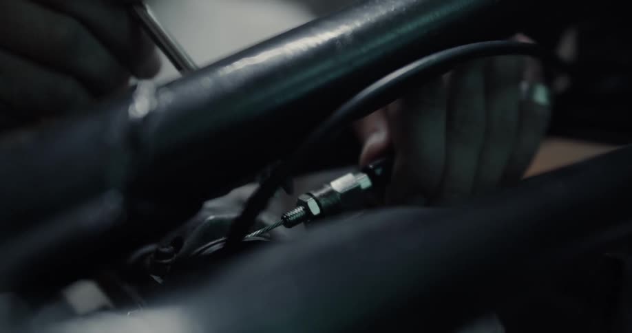 A person is fixing a machine