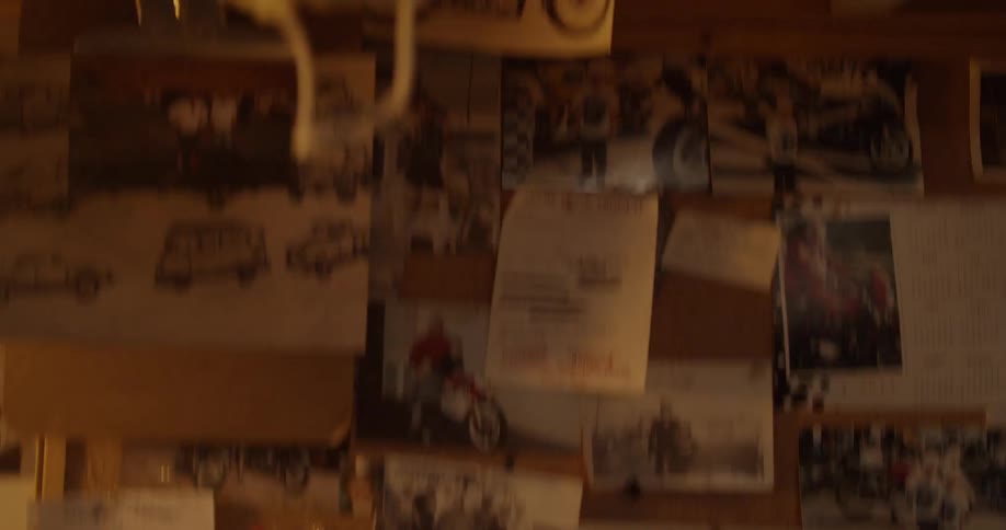 The wall is covered with clippings