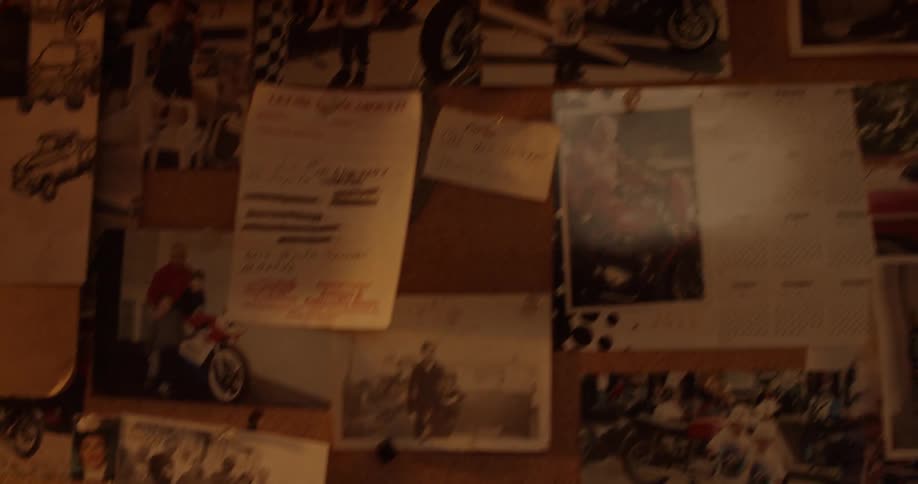 The cork board has many postings tacked