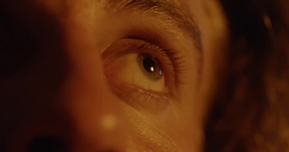 A person's eyes look around