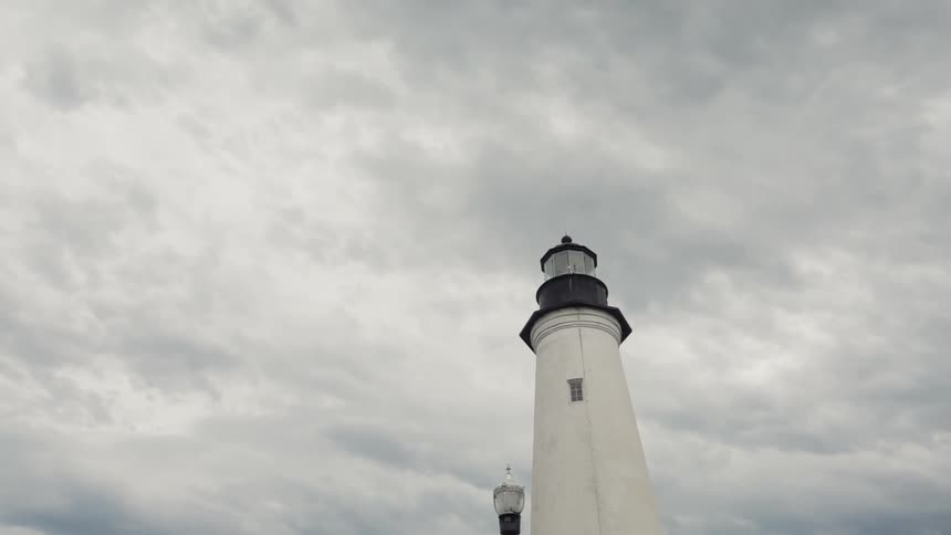 Clouds roll over a lighthouse