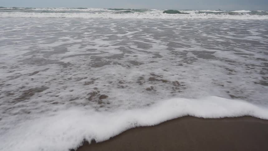 Water waves flow in from the ocean