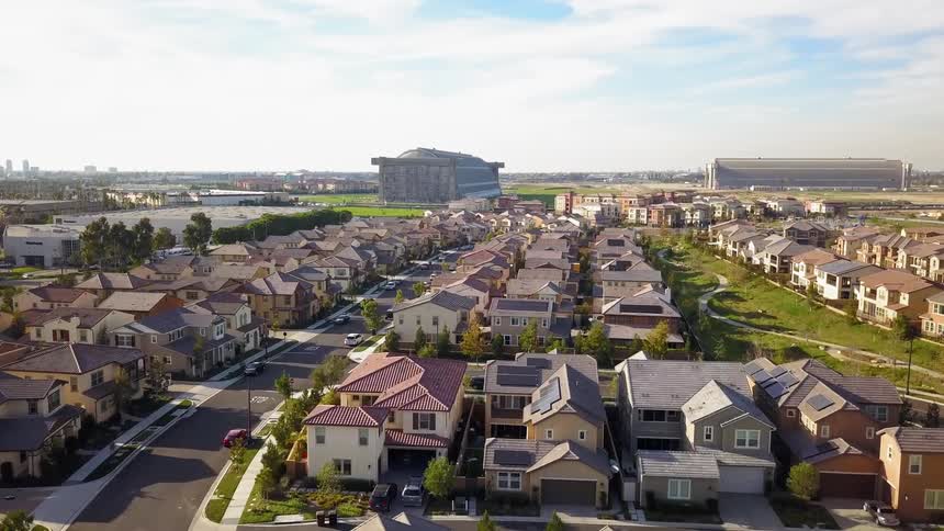 Houses sit in a neighborhood