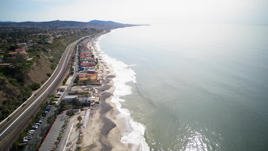 Ocean waves flow towards a shoreline