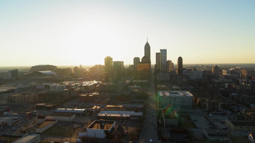 Sun rises over a large city