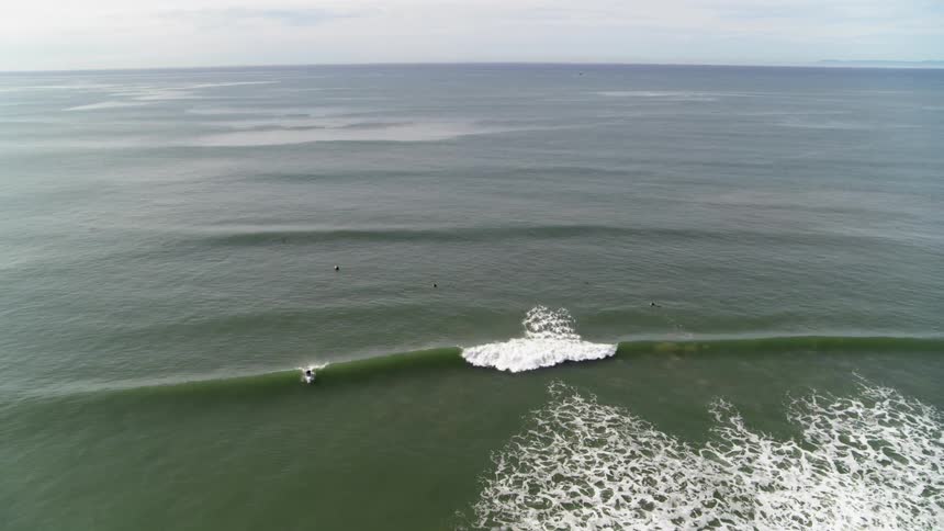 Waves roll and crash in the ocean