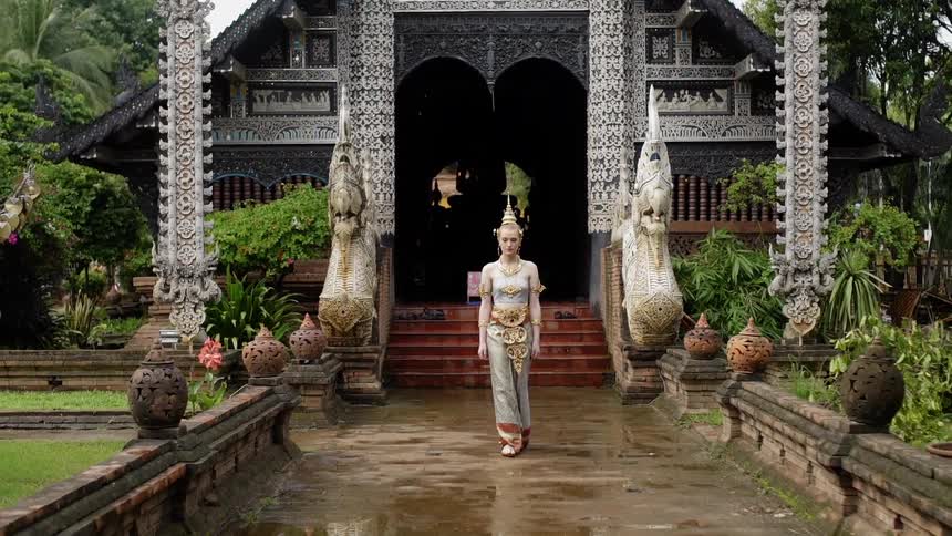 A woman walks outside