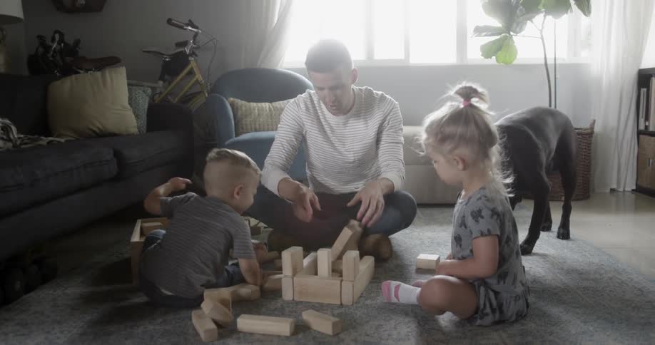 Father playing with his kids