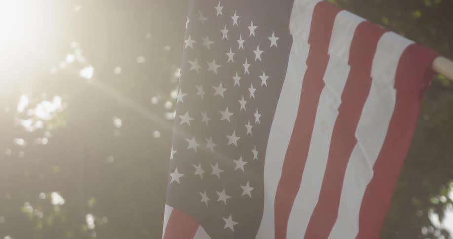 An american flag waves in the breeze