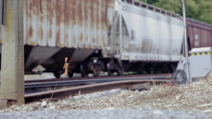 The train slowly moves on the tracks