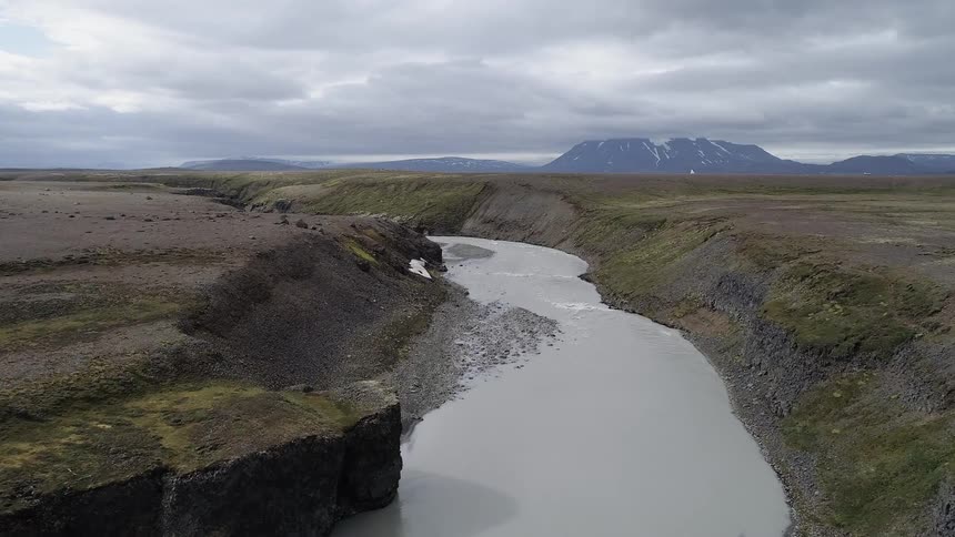 A river flows through a remote landscape