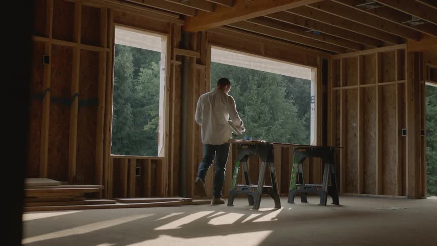 A man works at a construction site