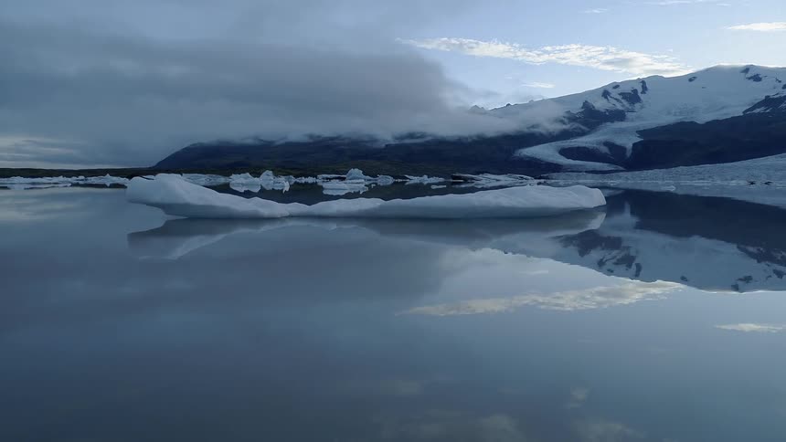 Icebergs float in the water
