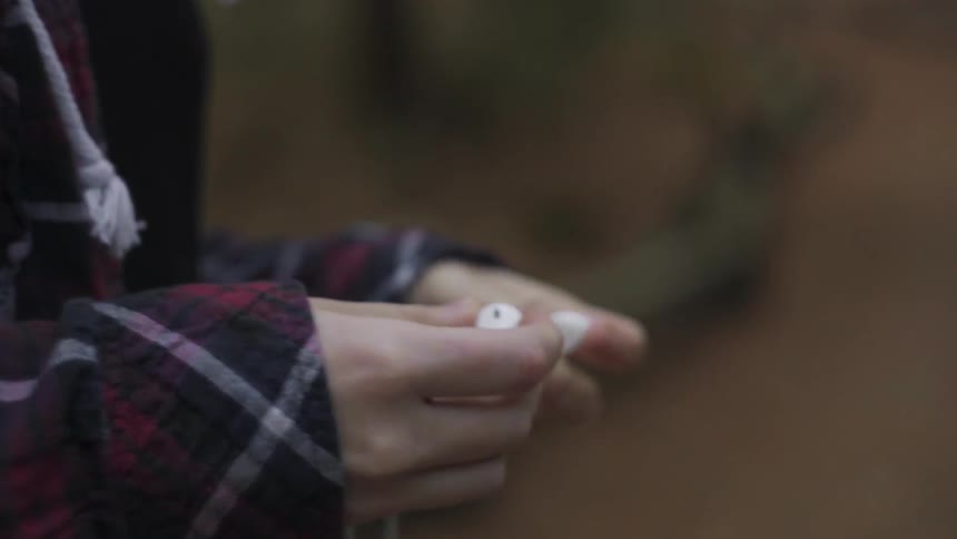 A person looking in their pocket