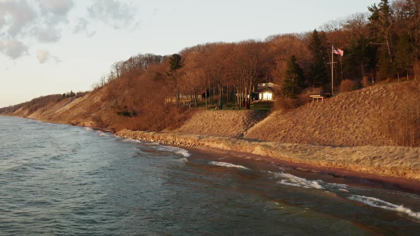 The waves crash against the shore