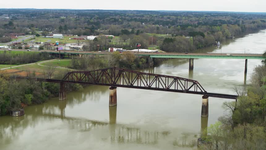 Vehicles travel across the bridge