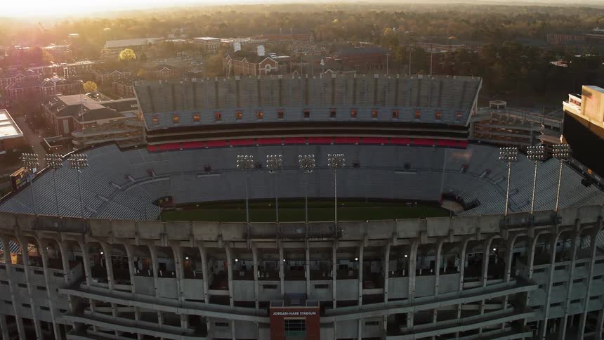 Large football stadium at sunset