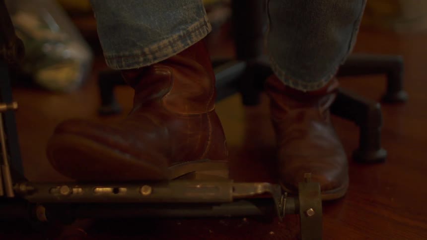A man pressed down on a pedal