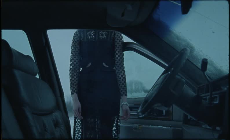 Woman Burning Car In Snow