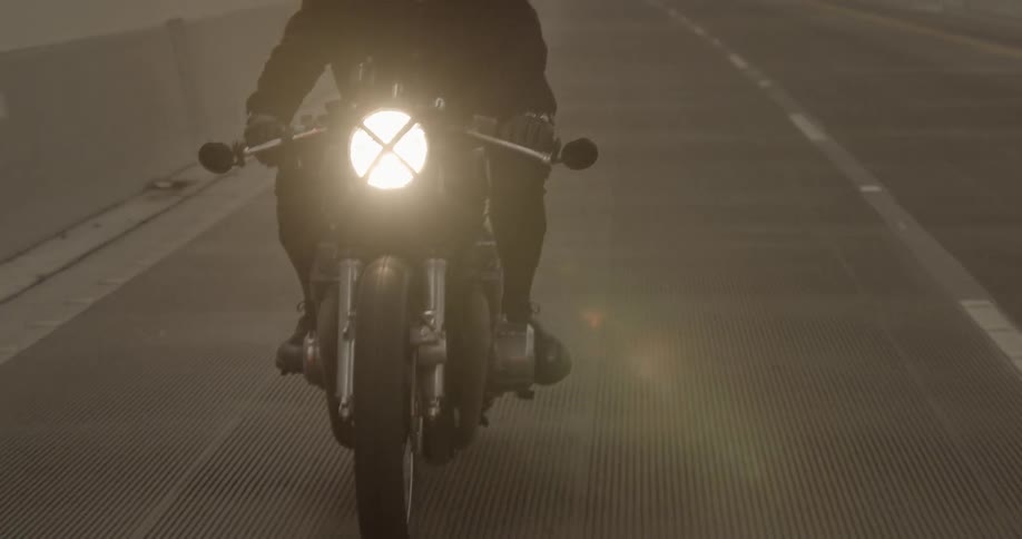 Motorcyclist rides in a city tunnel