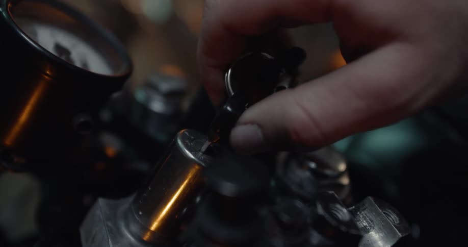 A key is turned in an ignition