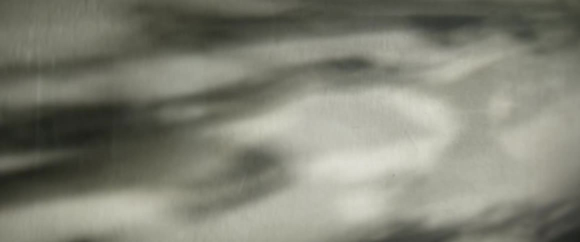 Shadows are cast on a wall
