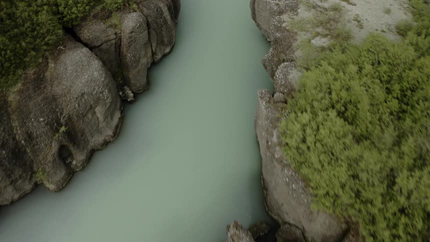 A river flows through canyons in the wilderness